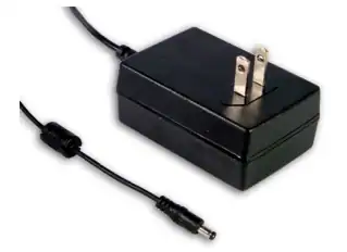 Professional power supply with AC plug and low-noise circuitry for high-end audio devices.